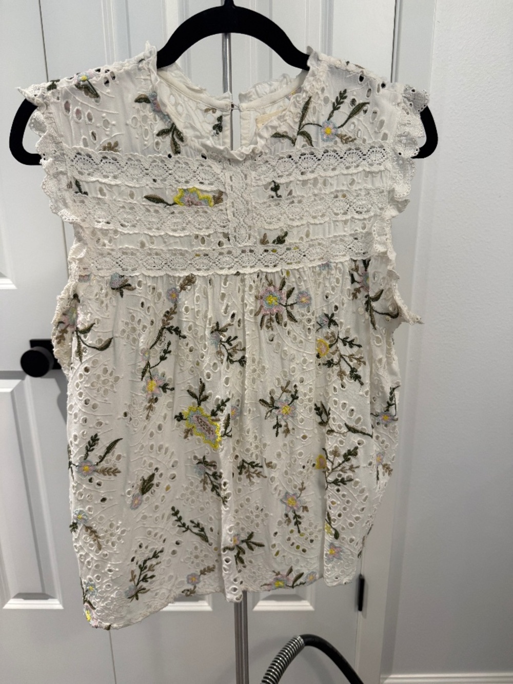 Lovestitch embroidered sleeveless blouse